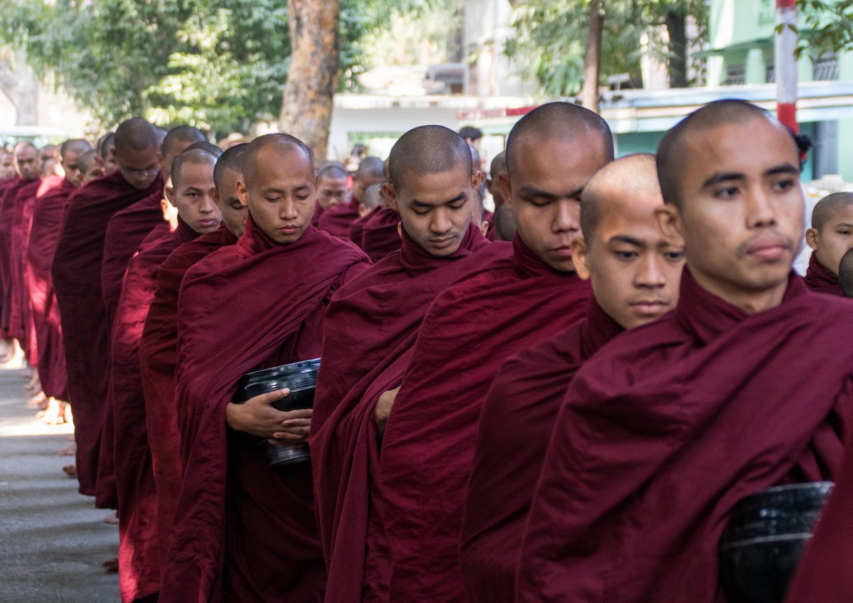 Monks queue for their breakfast Monks queue for their breakfast