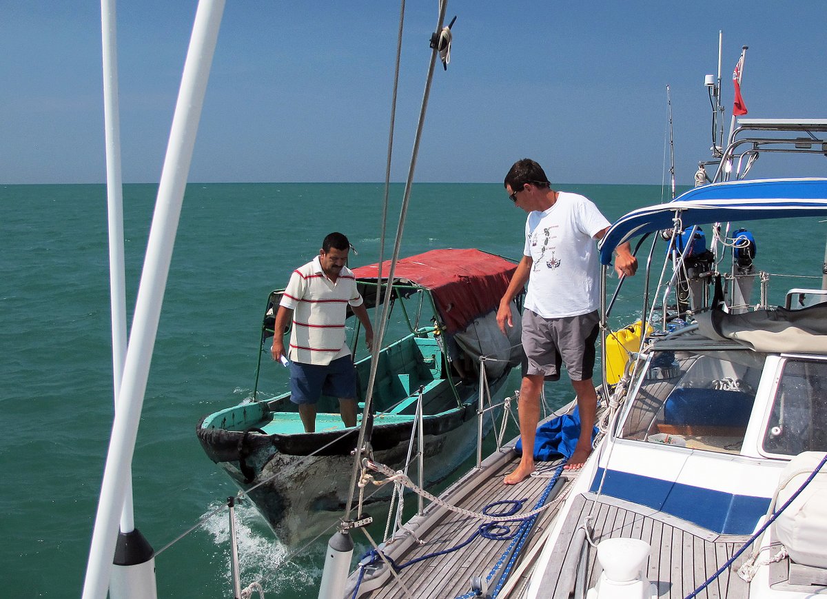 Pilot boarding us outside Bahia de Caraques, Ecuador Pilot boarding us outside Bahia de Caraques, Ecuador